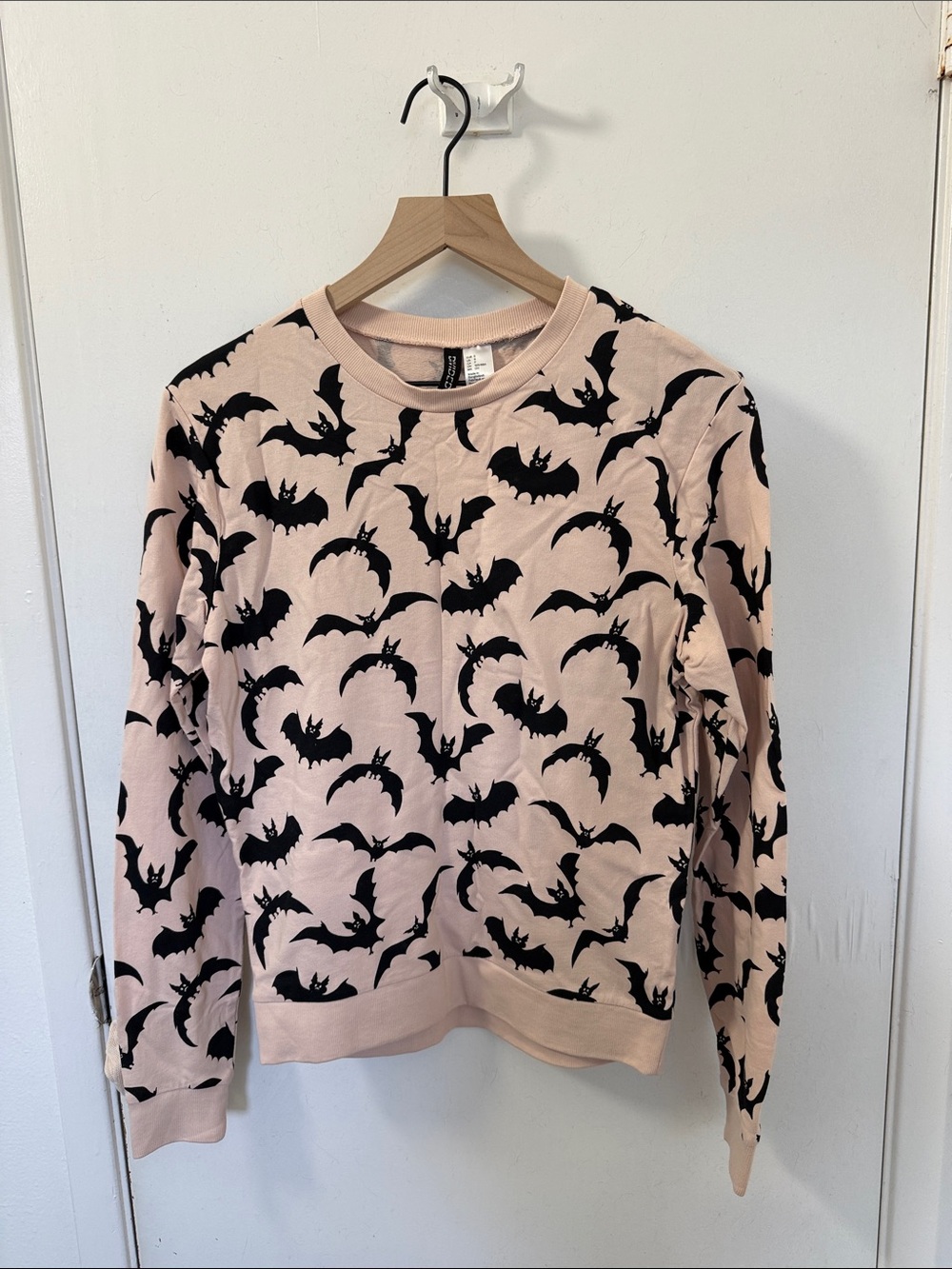 H&M Pink Crewneck Sweater with Black Bat Print